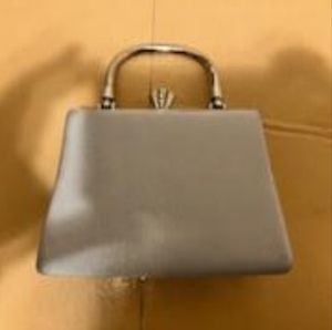 Evening shoulder or hand carry grey purse.